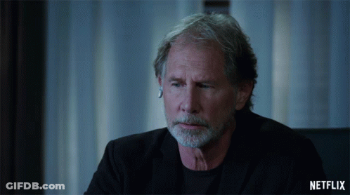 Man With Beard Sitting In Front Of Netflix Screen GIF