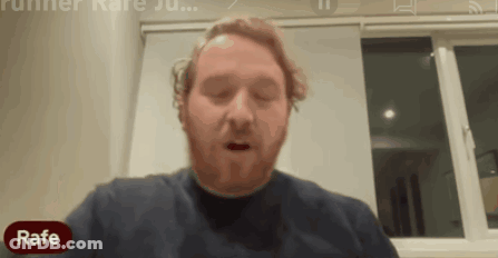 Man With Beard Sitting In Front Of Window Saying Rafe GIF