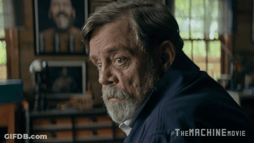 Man With Beard Sitting In Front Of Window #Themachinemovie GIF