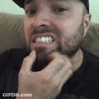 Man With Beard Sitting On Couch GIF