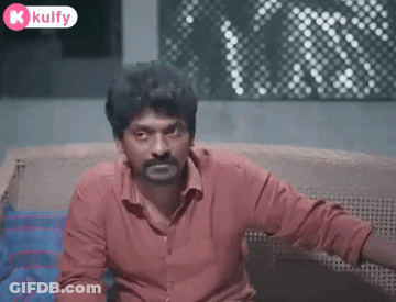 Man With Beard Sitting On Couch GIF
