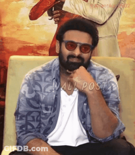 Man With Beard Sitting On Couch GIF