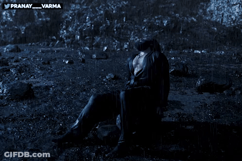 Man With Beard Sitting On Rock Pranay Varma GIF