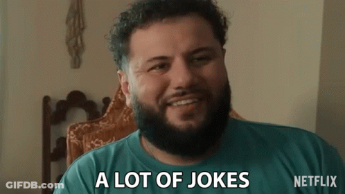 Man With Beard Smiling And Saying A Lot Of Jokes GIF