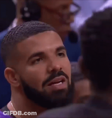 Man With Beard Smiling At Another Man GIF