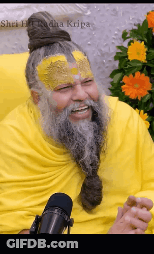 Man With Beard Smiling At Microphone Shri Radha Kripa GIF