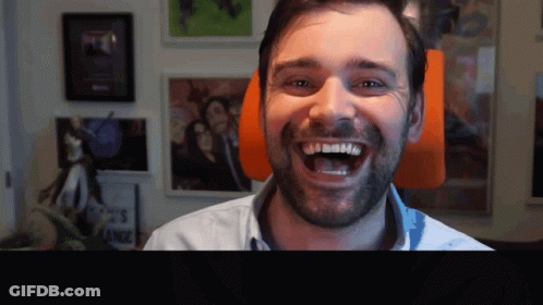 Man With Beard Smiling At Sign Ance GIF