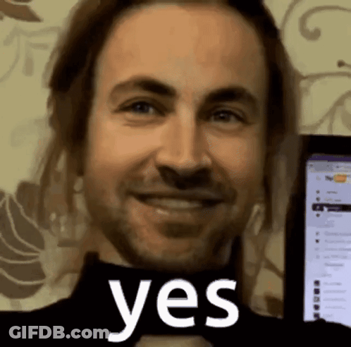 Man With Beard Smiling At Yes Screen GIF