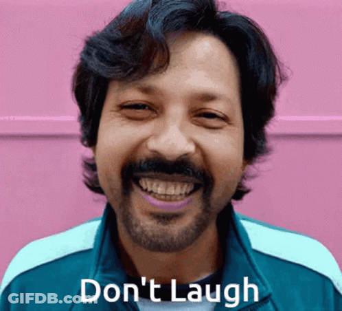 Man With Beard Smiling Don't Laugh GIF