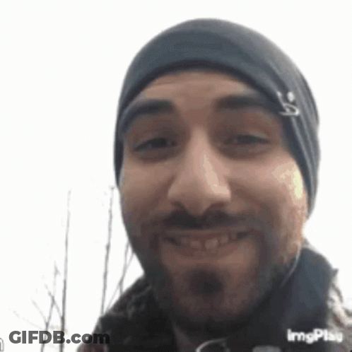 Man With Beard Smiling In Beanie GIF