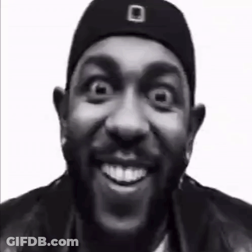 Man With Beard Smiling In Black And White GIF