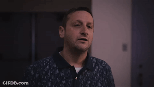 Man With Beard Smiling In Blue Polo Shirt GIF
