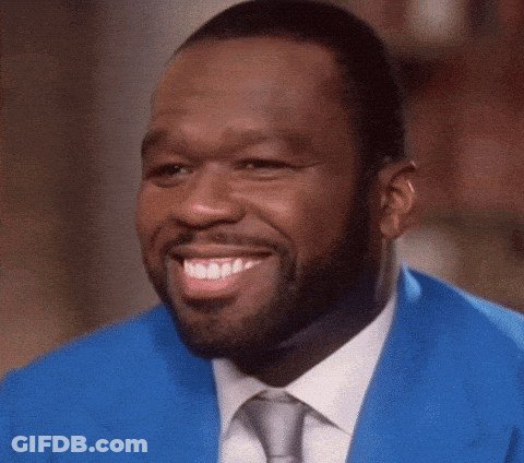 Man With Beard Smiling In Blue Suit And White Shirt GIF