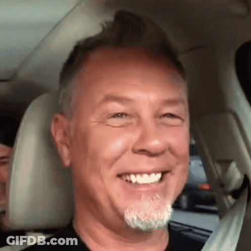 Man With Beard Smiling In Car Seat GIF