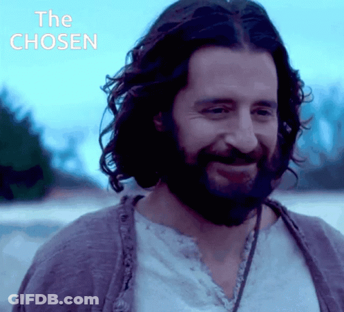 Man With Beard Smiling In Front Of The Chosen Sign GIF