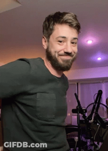 Man With Beard Smiling In Green Shirt GIF