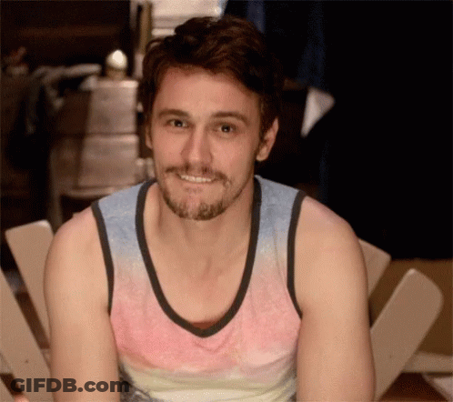 Man With Beard Smiling In Tank Top GIF