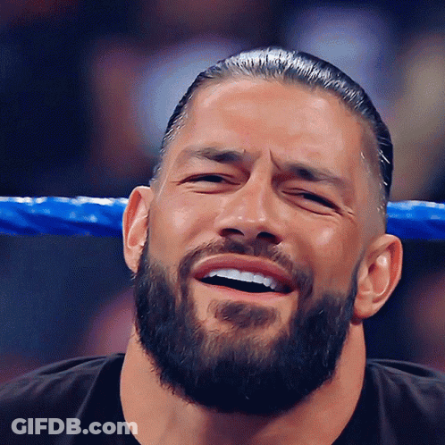 Man With Beard Smiling In Wrestling Ring GIF