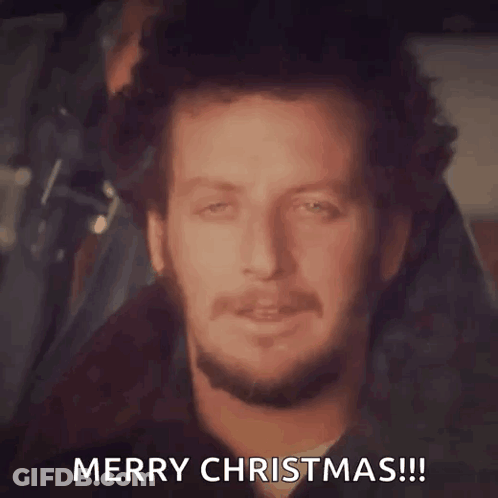 Man With Beard Smiling Says Merry Christmas GIF