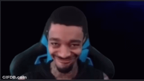 Man With Beard Smiling Sitting In Chair GIF