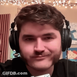 Man With Beard Smiling Wearing Headphones GIF