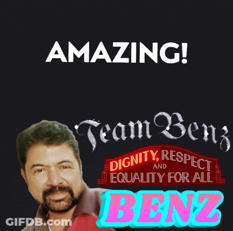 Man With Beard Standing Before Amazing Team Benz Sign GIF
