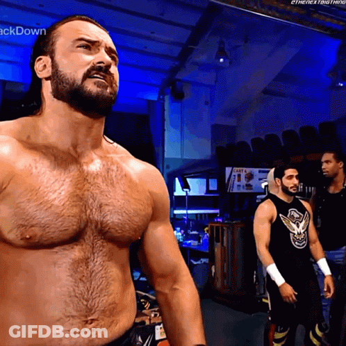 Man With Beard Standing Before Cast Sign GIF