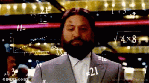 Man With Beard Standing Before Math Equations GIF