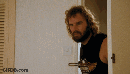 Man With Beard Standing In Doorway GIF
