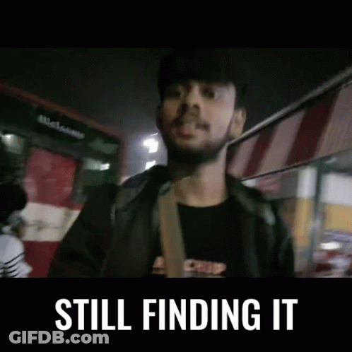 Man With Beard Standing In Front Of Bus Saying Still Finding It GIF
