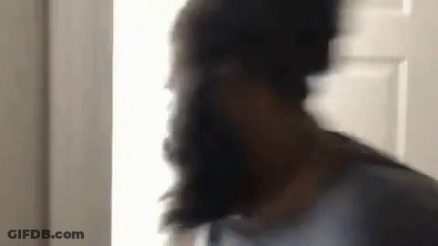 Man With Beard Standing In Front Of Door GIF