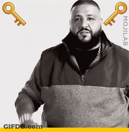 Man With Beard Standing In Front Of Keys GIF