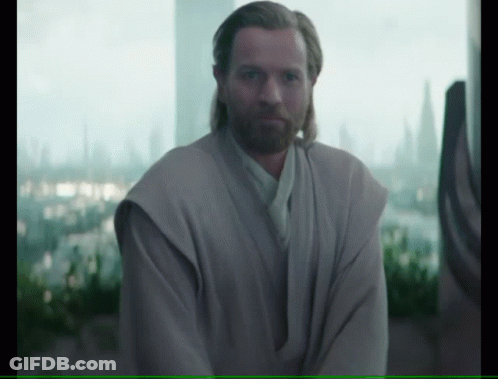 Man With Beard Standing In Front Of Large Window GIF