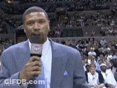 Man With Beard Standing In Front Of Microphone GIF