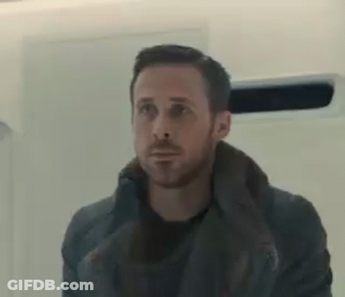 Man With Beard Standing In Front Of Mirror GIF