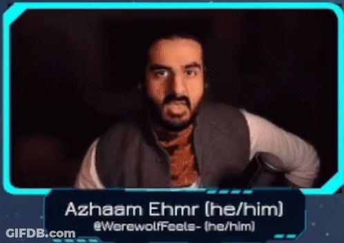 Man With Beard Standing In Front Of Screen Saying Azhaam Ehrmr GIF