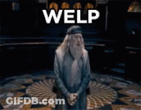 Man With Beard Standing In Front Of Welp Sign GIF