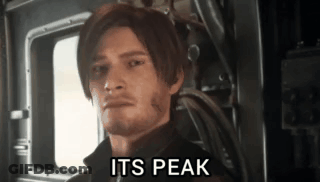 Man With Beard Standing In Front Of Window Saying Its Peak GIF