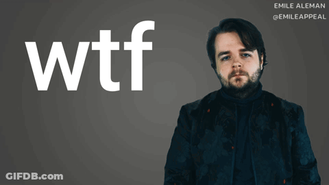 Man With Beard Standing In Front Of WTF Sign GIF