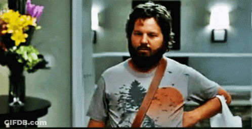 Man With Beard Standing In Room GIF