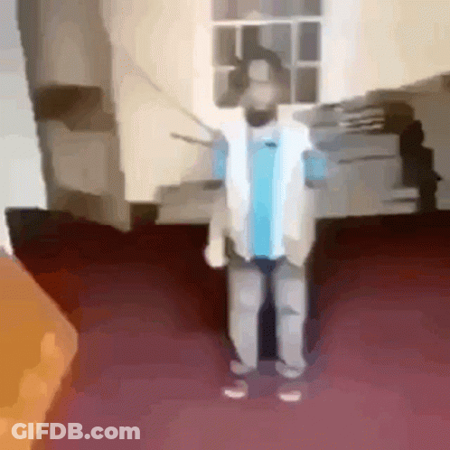 Man With Beard Standing On Red Carpet GIF