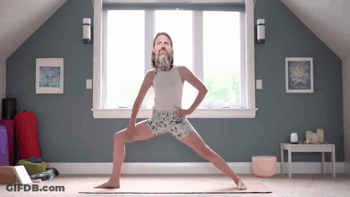 Man With Beard Standing On Yoga Mat GIF