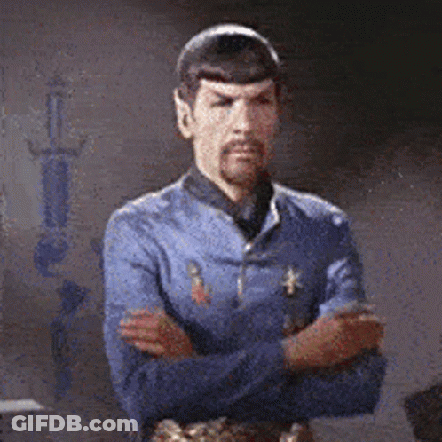 Man With Beard Standing With Arms Crossed GIF