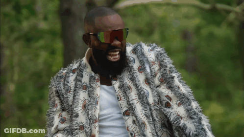Man With Beard Sunglasses And Furry Jacket GIF