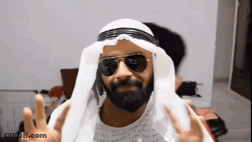Man With Beard Sunglasses White Turban Making Peace Sign GIF