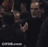 Man With Beard Surrounded By People GIF
