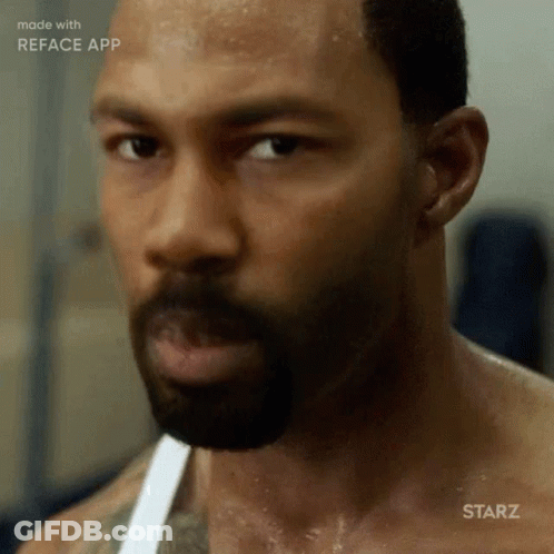 Man With Beard Sweating And Looking At Camera GIF