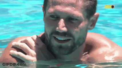 Man With Beard Swimming In Pool With Netflix Sign GIF