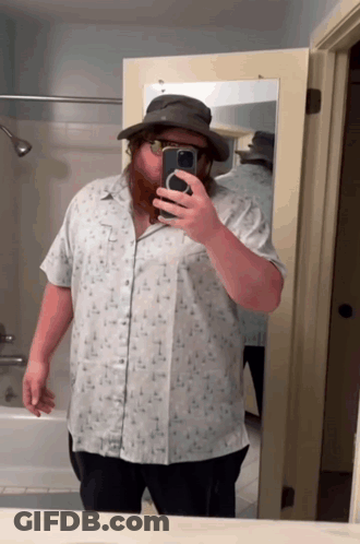 Man With Beard Taking Mirror Selfie GIF