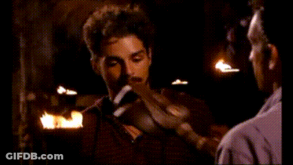 Man With Beard Talking By Fire GIF